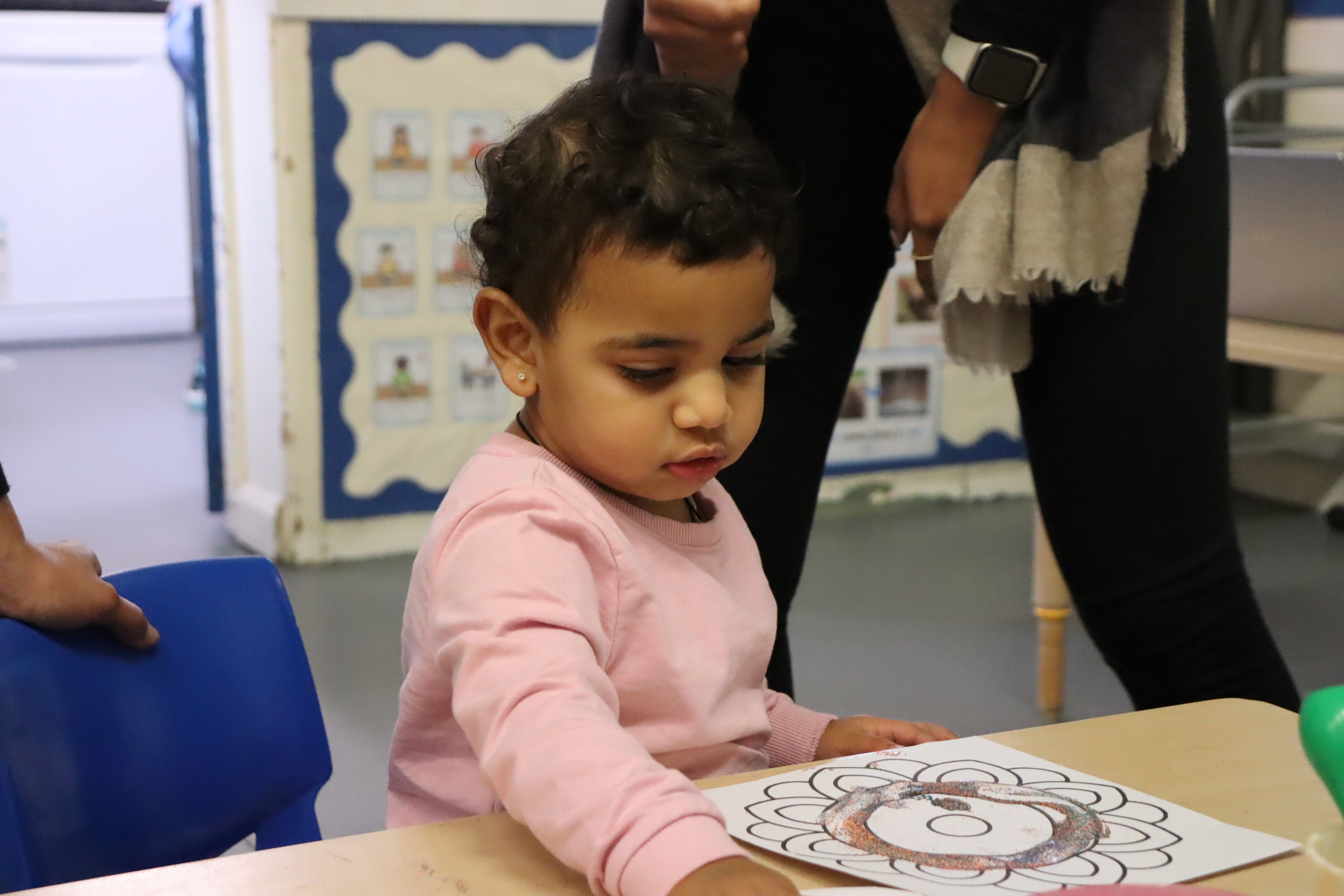 One of Budding learners babies captured in the middle an art activity during Diwali