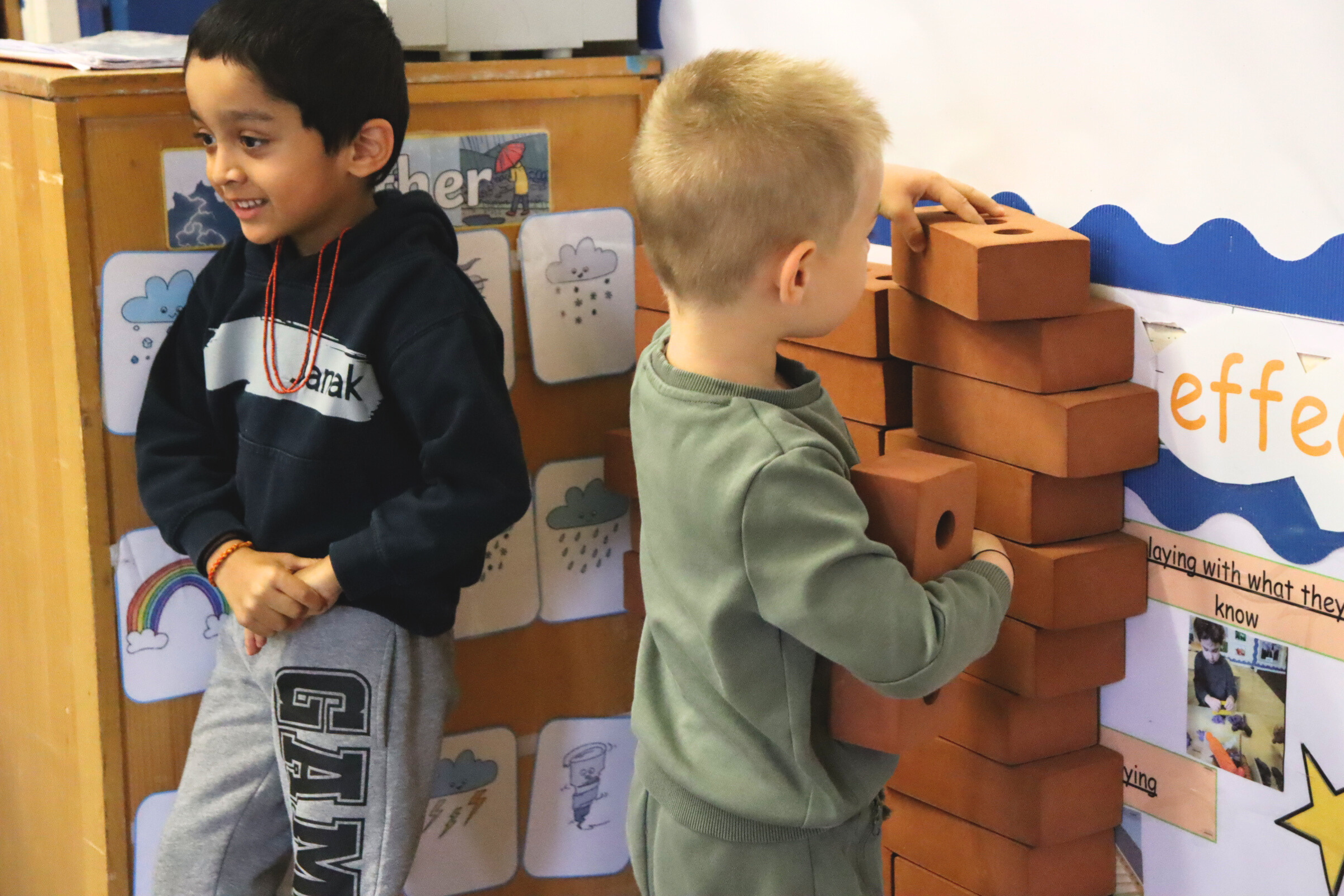 a Budding Learner's preschooler working on a Montessori activity on his own