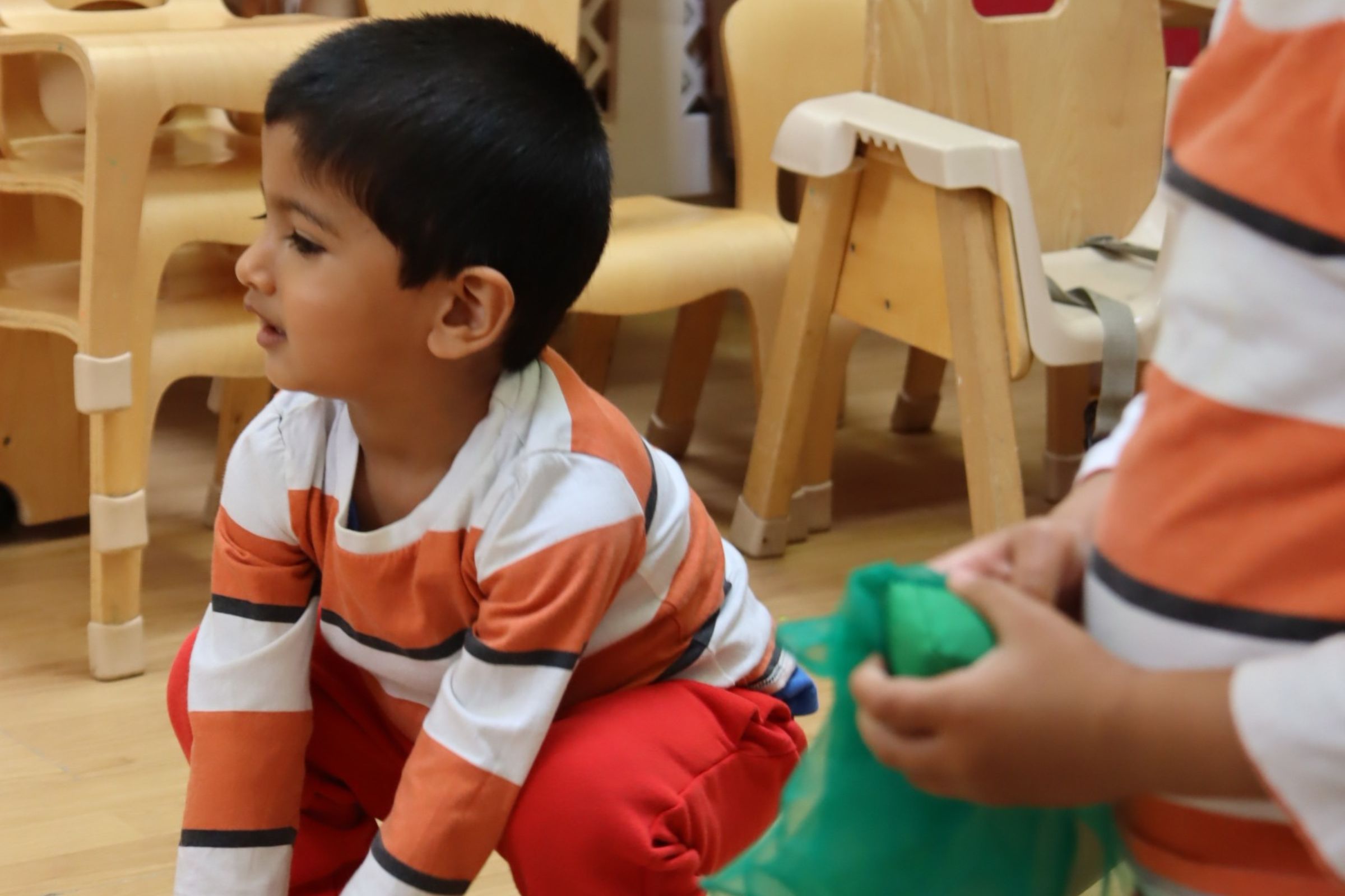 Two toddlers dancing to music on Fun Friday