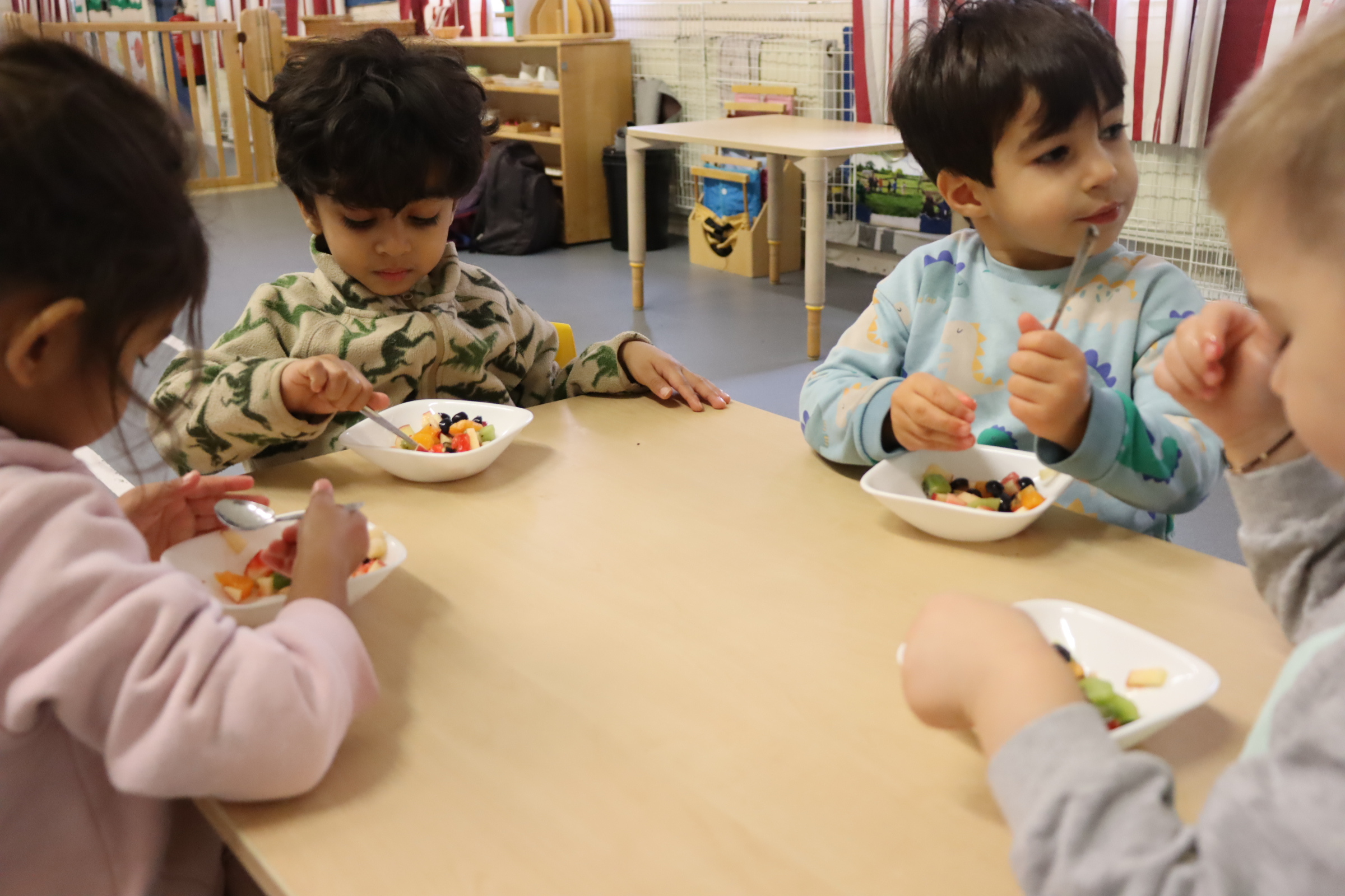 Preschoolers having lunch at Budding Learners